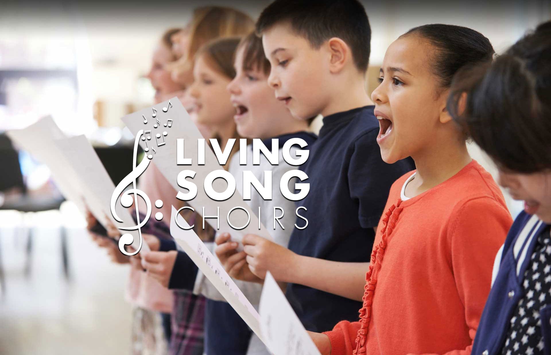 Children singing with Living Song Choirs logo