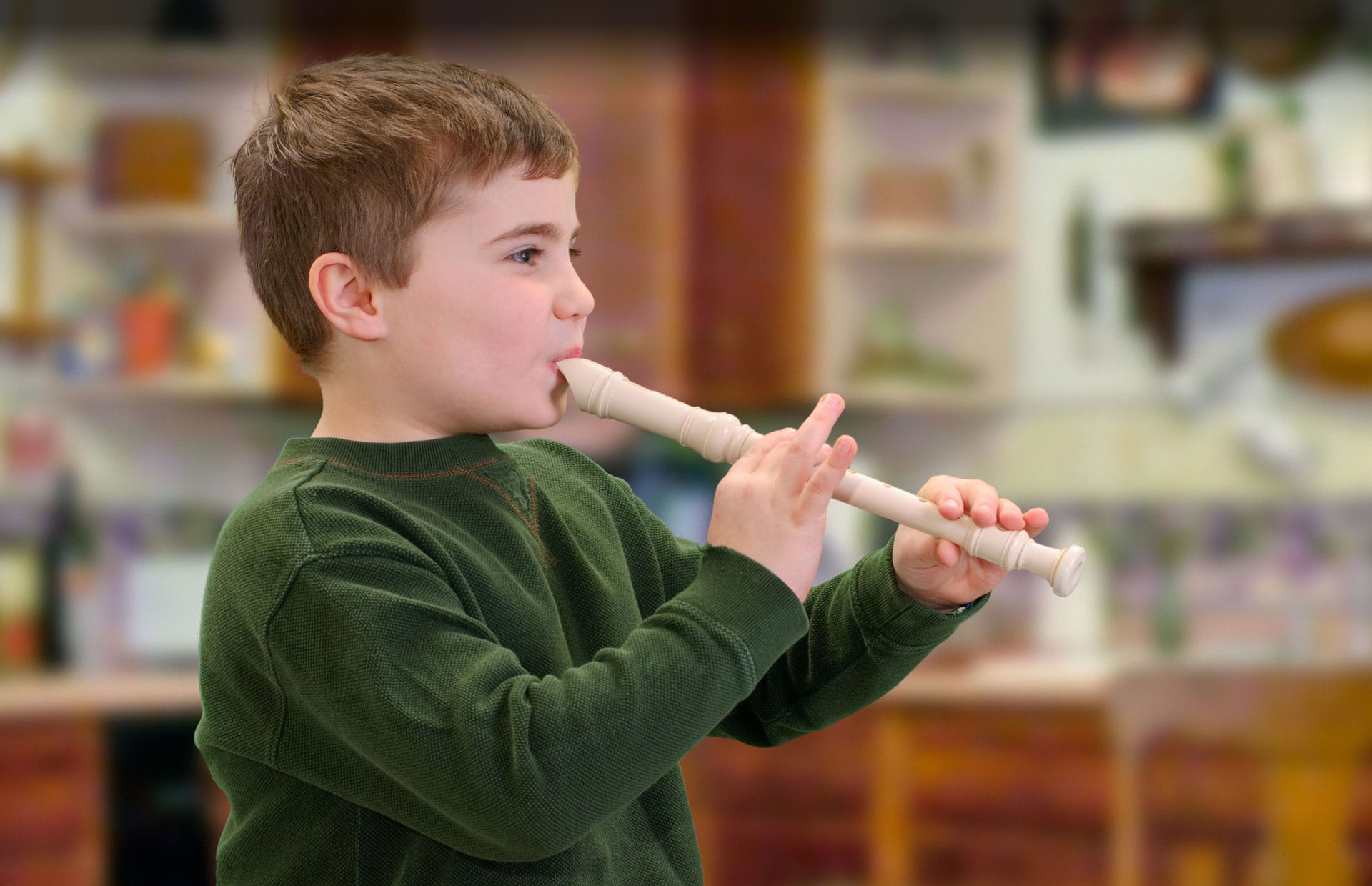 Child playing the flute